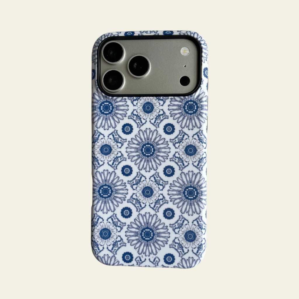 Full front view of Mewvia Blue Heritage Kaleidoscope case for iPhone 17 Pro Max, showcasing the intricate blue and white mandala patterns.