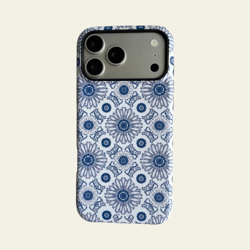 Full front view of Mewvia Blue Heritage Kaleidoscope case for iPhone 17 Pro Max, showcasing the intricate blue and white mandala patterns.
