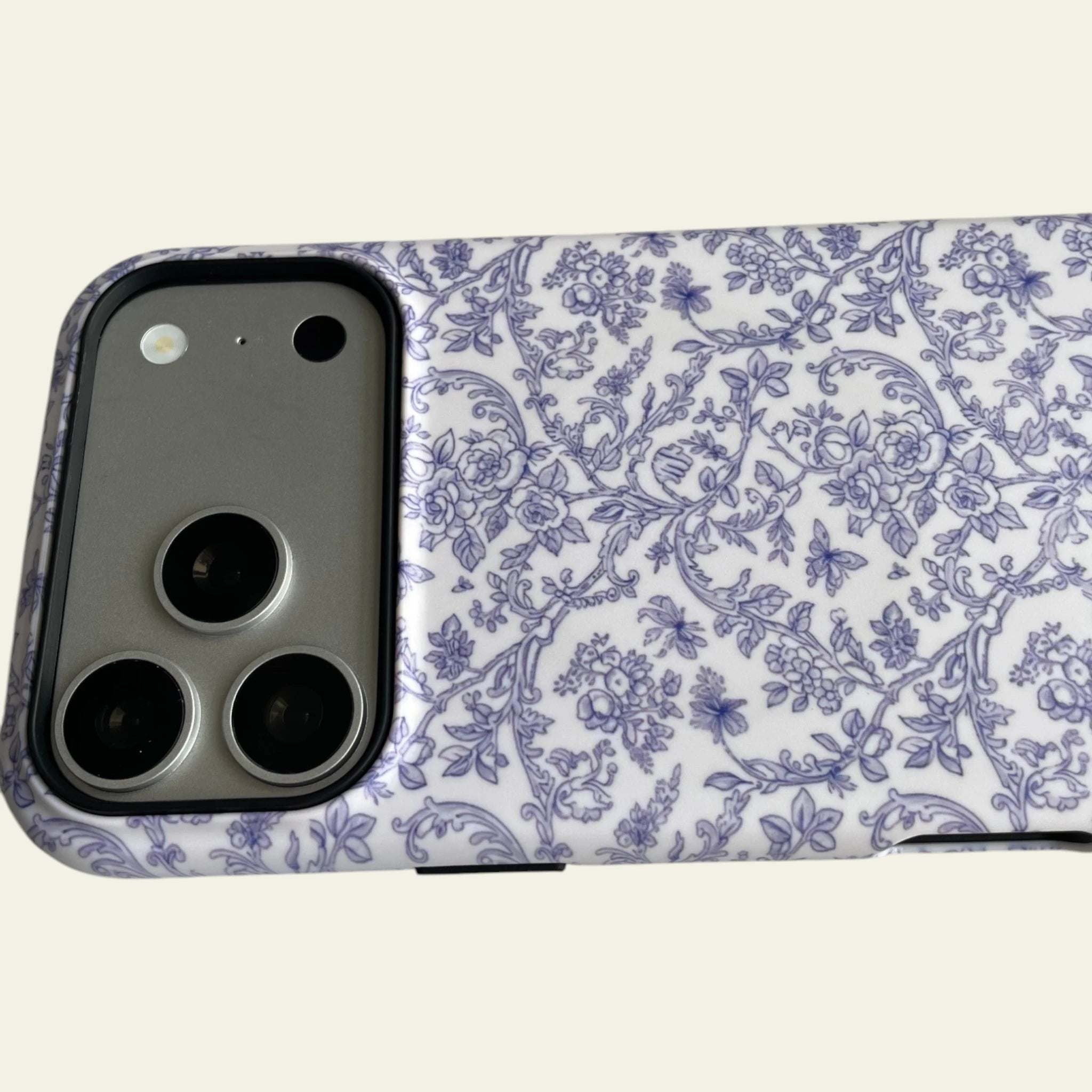 Close-up of the raised camera bezel on the iPhone 17 Pro Max case, ensuring professional-grade lens protection.