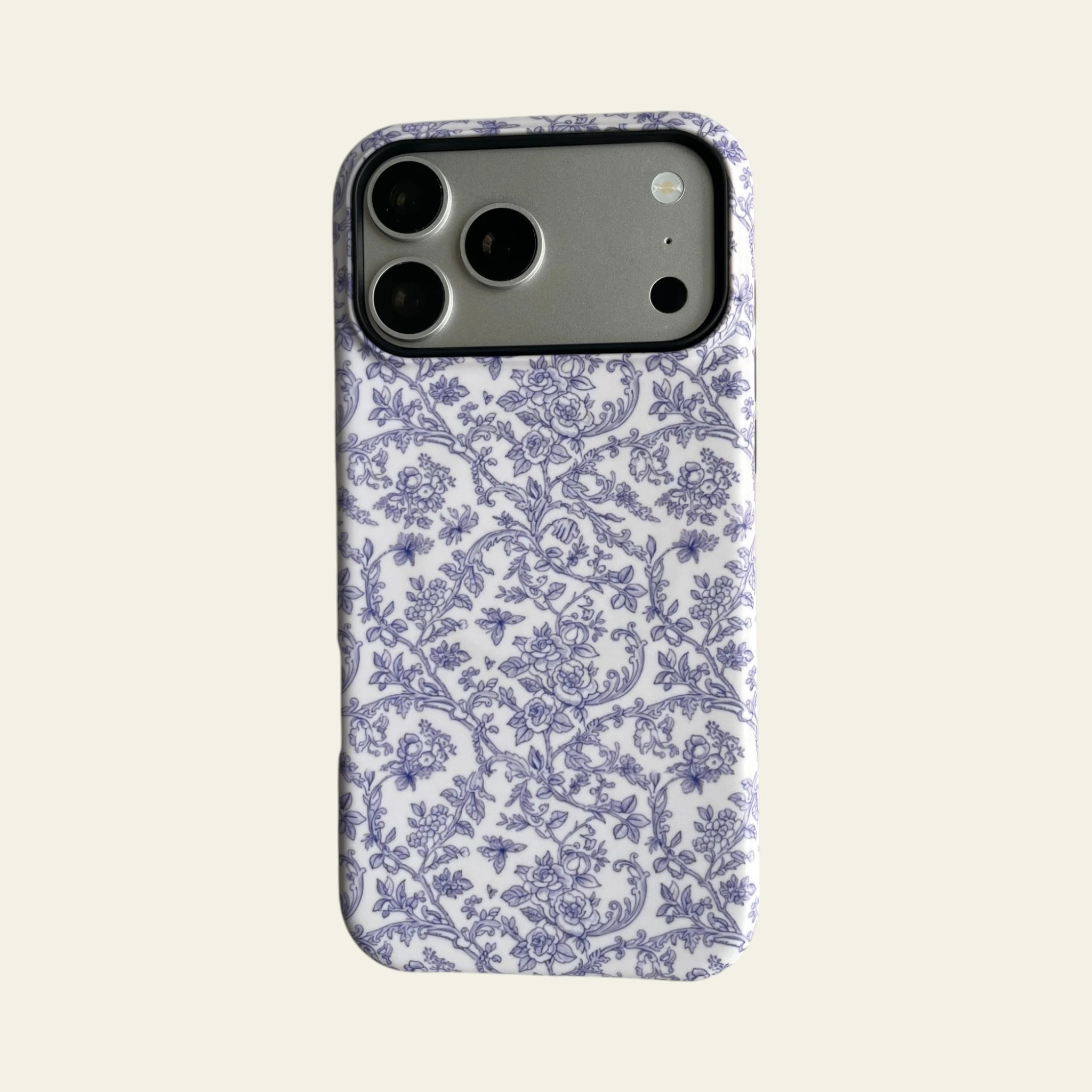 Front view of Mewvia Blue Toile Floral case for iPhone 17 Pro Max, showcasing the intricate blue botanical prints and matte finish.