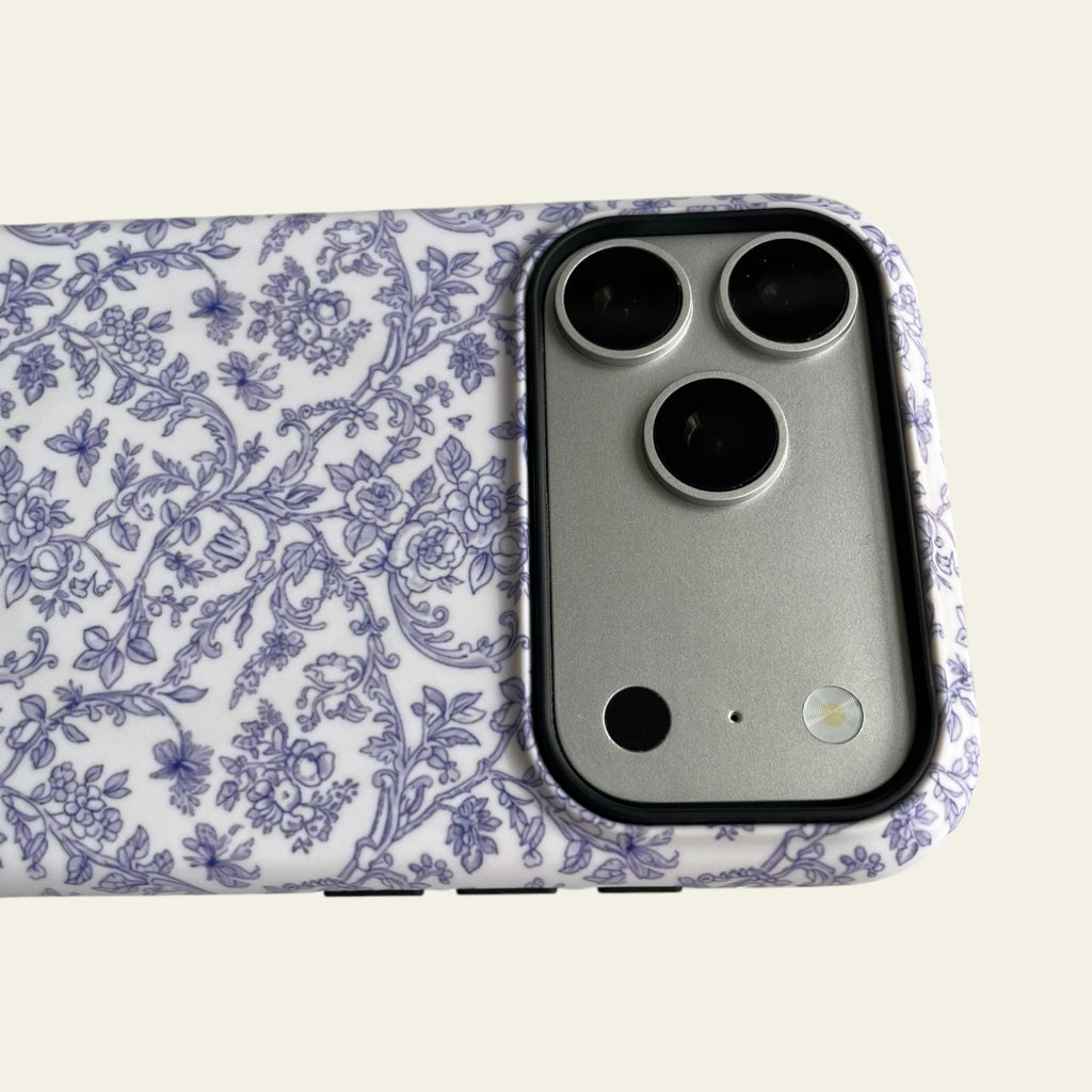 Close-up of the premium matte texture on the Blue Toile Floral case, designed to be anti-fingerprint and not easy to fade.