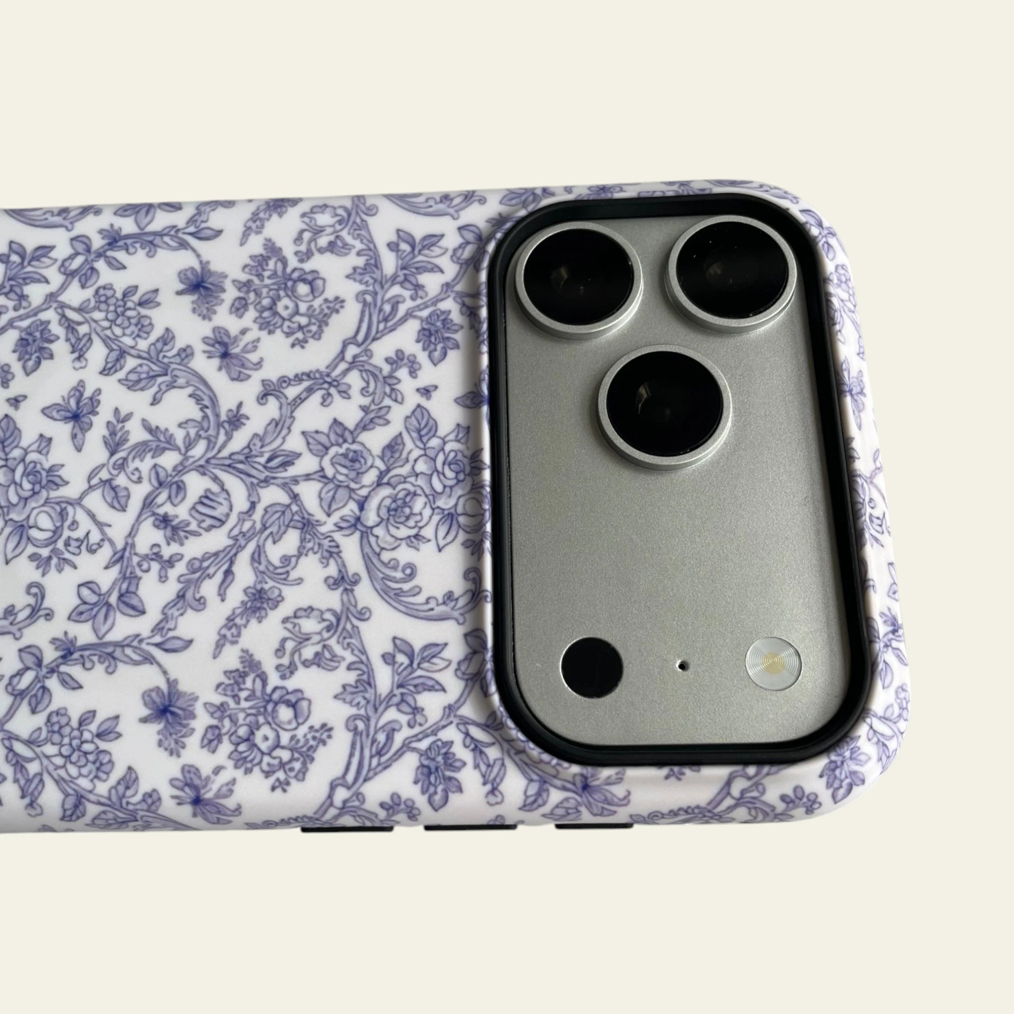 Close-up of the premium matte texture on the Blue Toile Floral case, designed to be anti-fingerprint and not easy to fade.