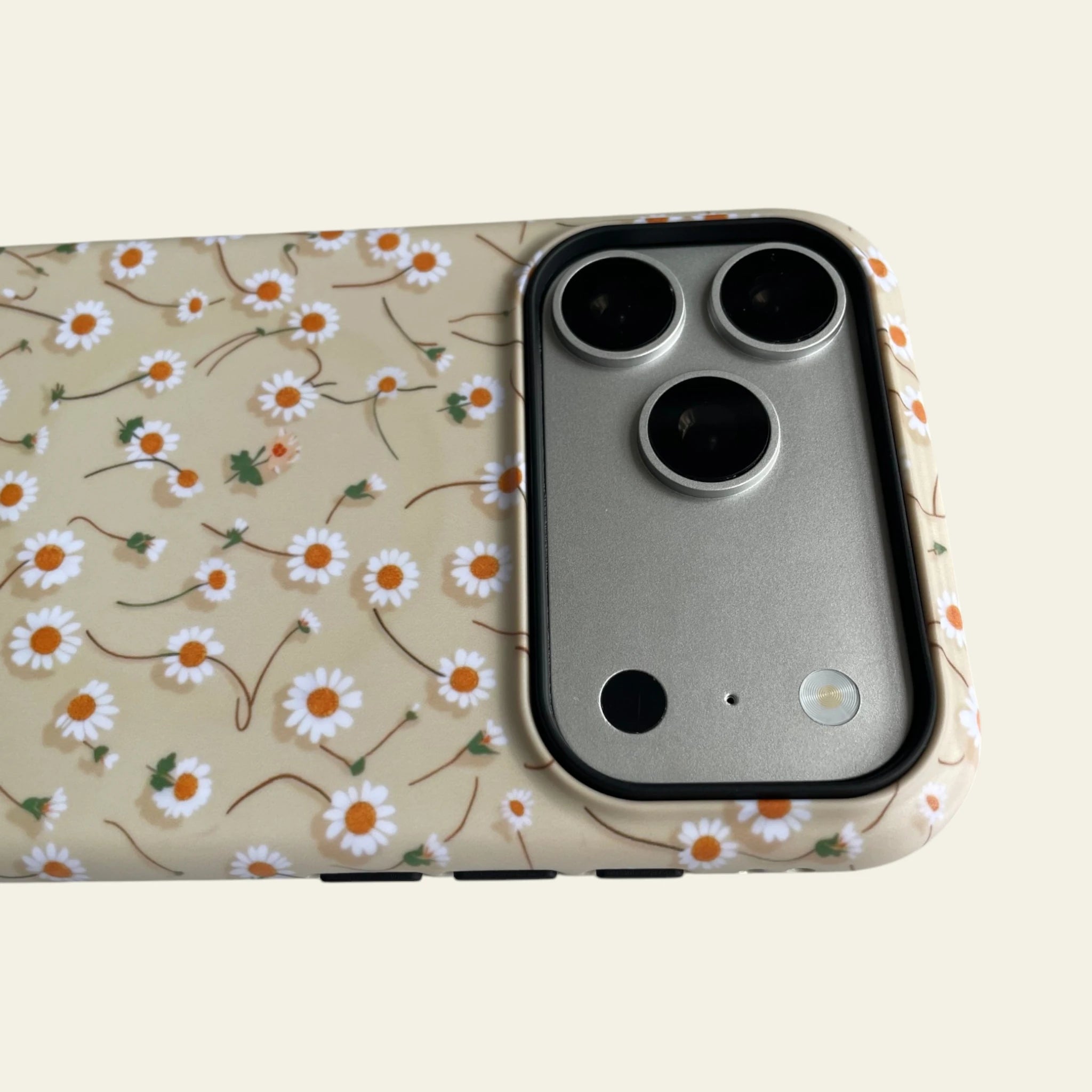 Detailed view of the raised black camera bezel on the iPhone 17 Pro Max case, ensuring professional lens protection.
