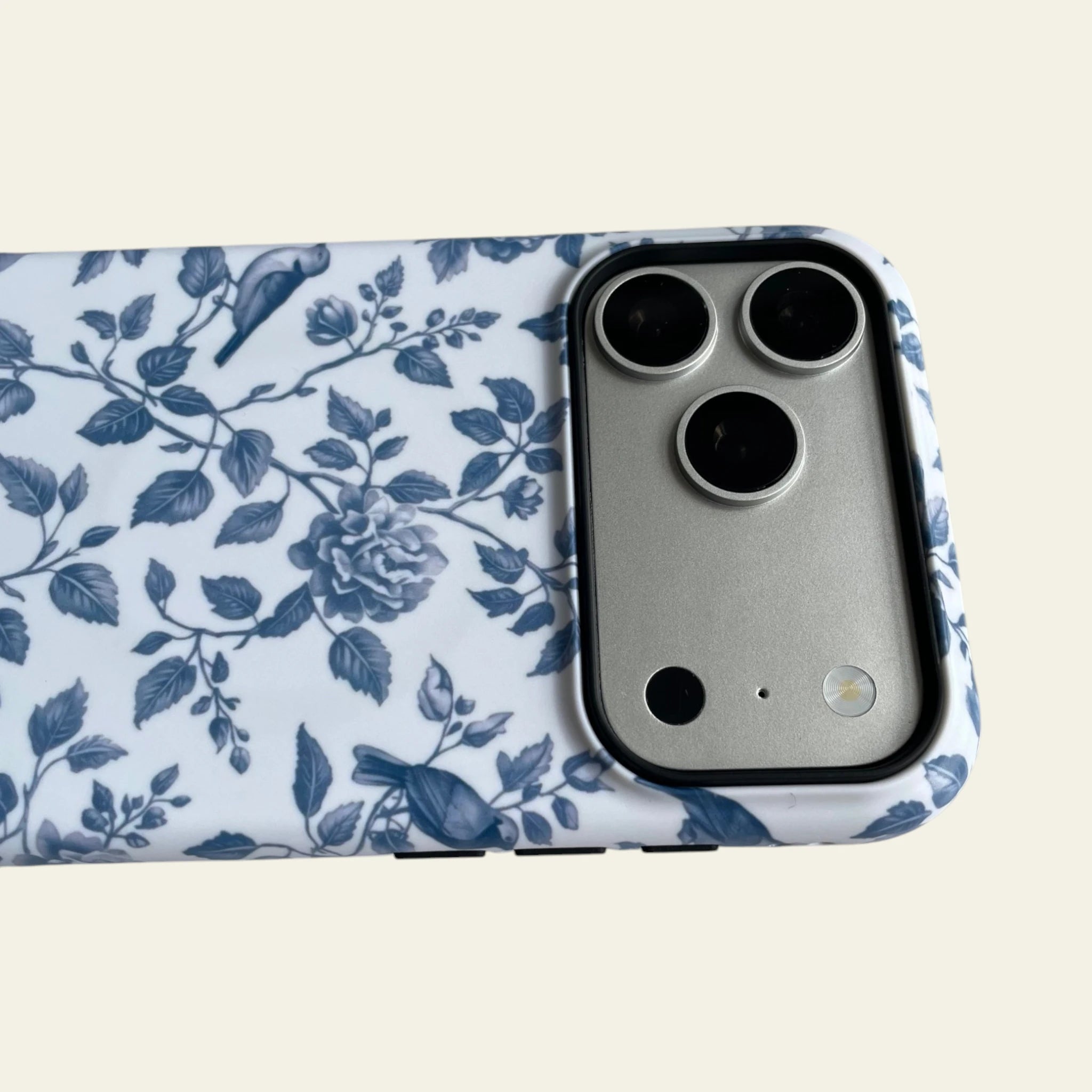 Detailed shot of the raised camera bezel on the iPhone 17 Pro Max case, providing professional-grade protection for the camera lenses.