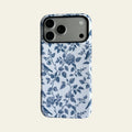 Front view of Mewvia Classic Blue Toile Floral case for iPhone 17 Pro Max, showcasing the intricate vintage botanical patterns and MagSafe compatibility.