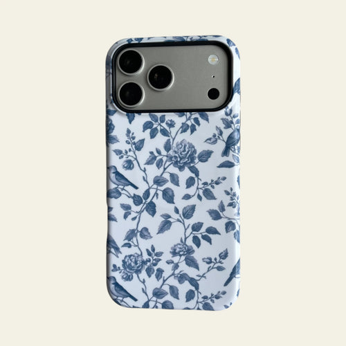 Front view of Mewvia Classic Blue Toile Floral case for iPhone 17 Pro Max, showcasing the intricate vintage botanical patterns and MagSafe compatibility.