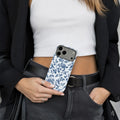 Classic Blue Toile Floral matte case on iPhone 17 Pro Max, styled with fine porcelain and fresh linen in a soft, bright minimalist setting.