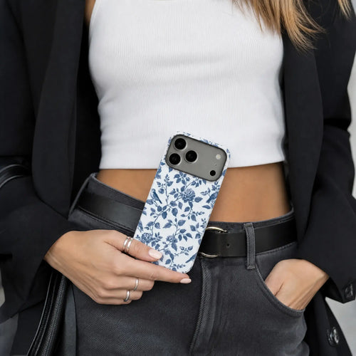 Classic Blue Toile Floral matte case on iPhone 17 Pro Max, styled with fine porcelain and fresh linen in a soft, bright minimalist setting.