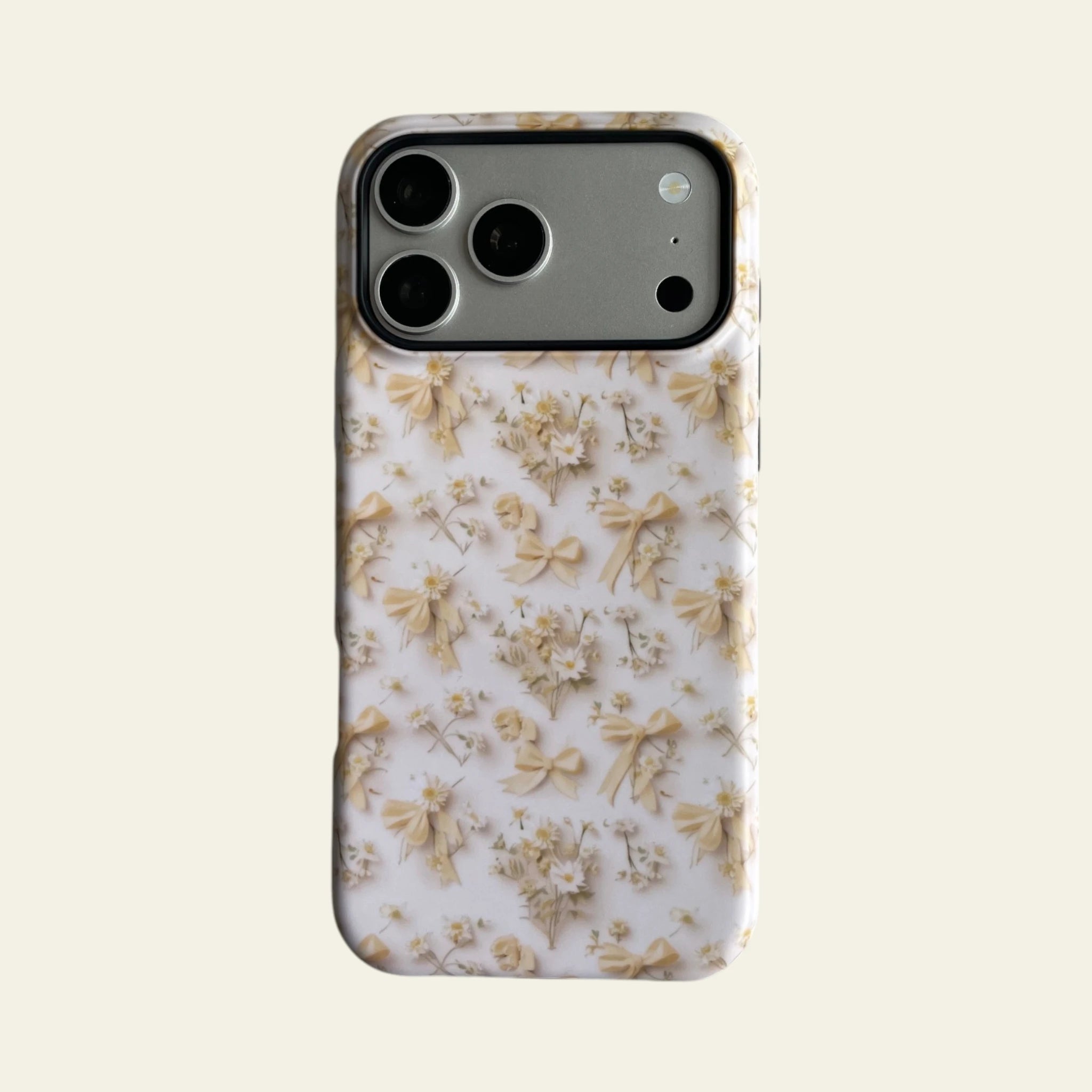 Front view of Mewvia Coquette Bow & Daisy case for iPhone 17 Pro Max, showcasing the intricate floral and ribbon patterns with MagSafe compatibility.