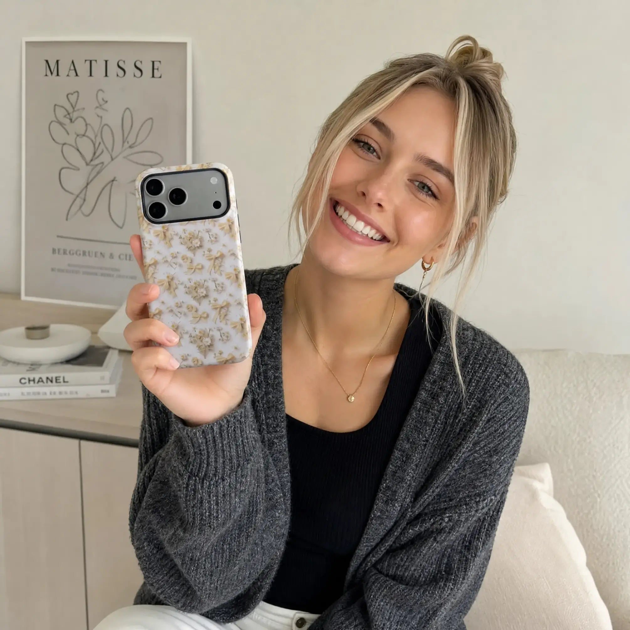 Coquette Bow and Daisy matte case on iPhone 17 Pro Max, styled with silk ribbons and pearl accessories in a minimalist, soft-lit setting.