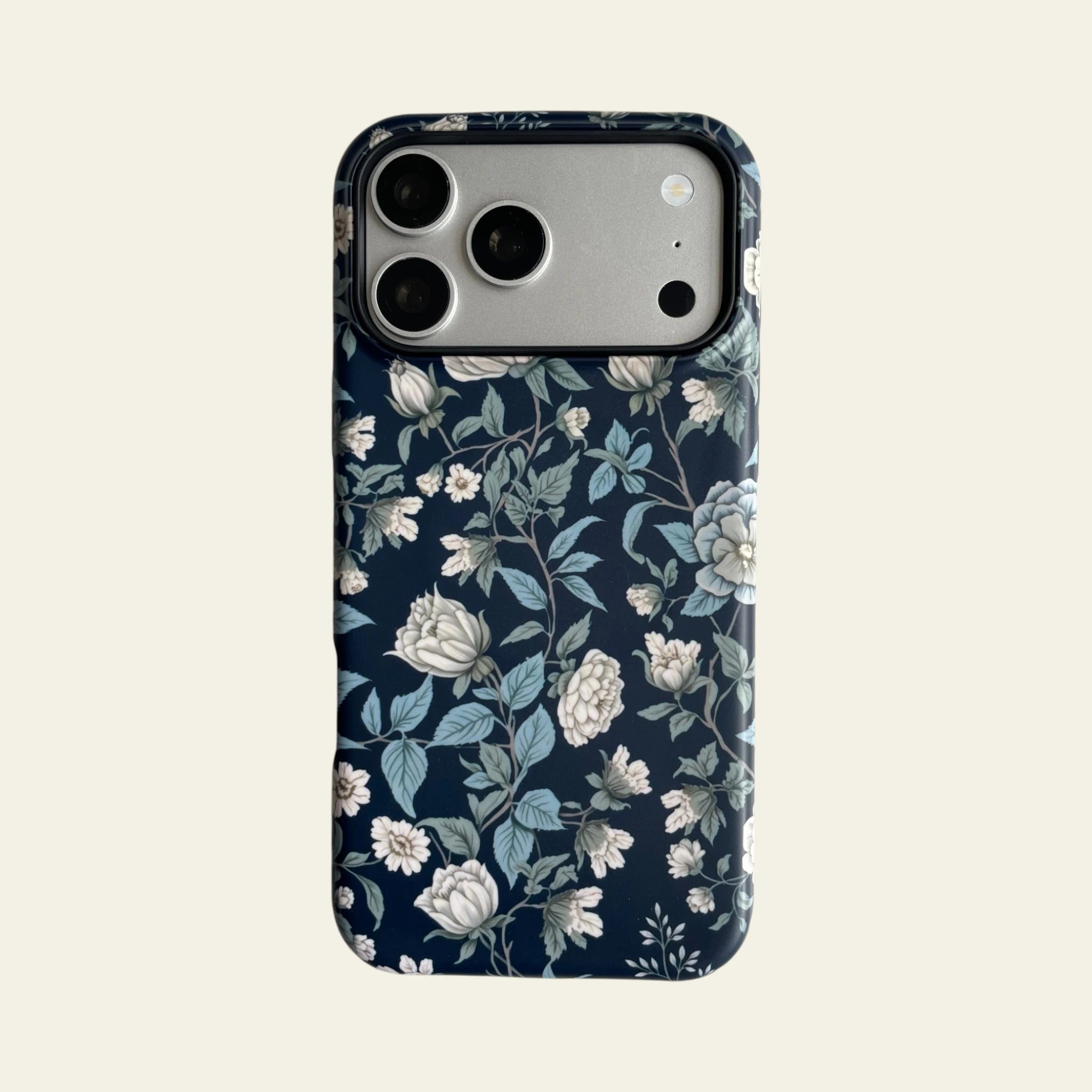 Front view of Mewvia Midnight Botanical case for iPhone 17 Pro Max, showcasing the intricate dark floral prints and MagSafe compatibility.