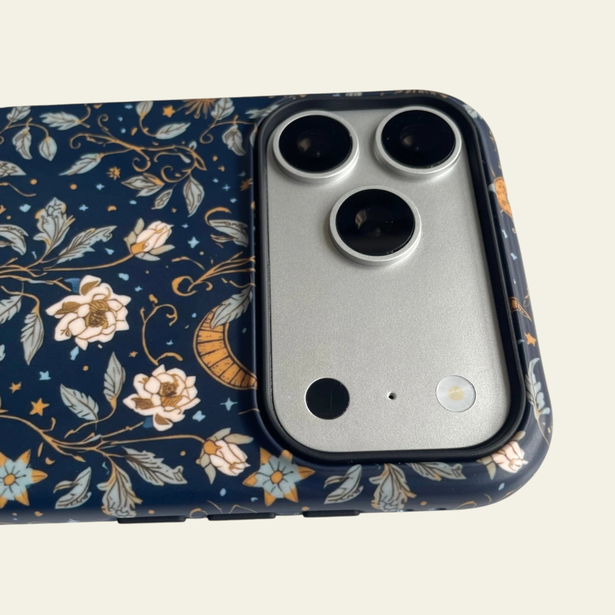Detailed view of the raised camera bezel on the iPhone 17 Pro Max case, providing professional protection for the lens.
