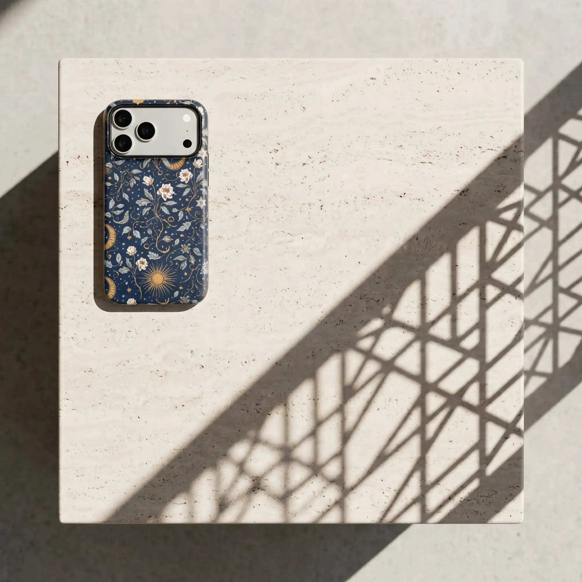 Premium Midnight Celestial Floral matte case on iPhone 17 Pro Max, vintage botanical design in a high-texture setting.