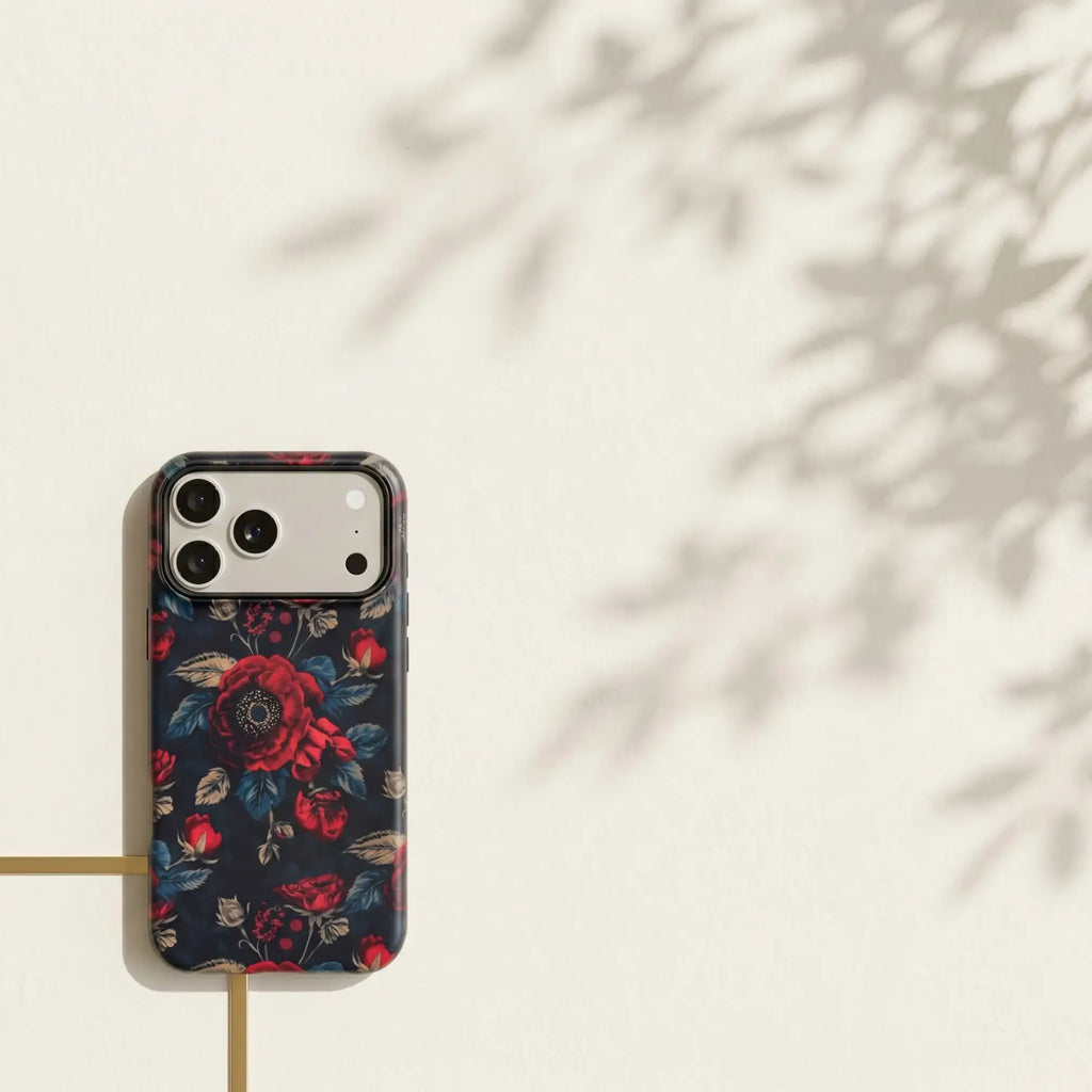 Mewvia Moody Dark Botanical floral case for iPhone 17 Pro Max in a lifestyle setting.