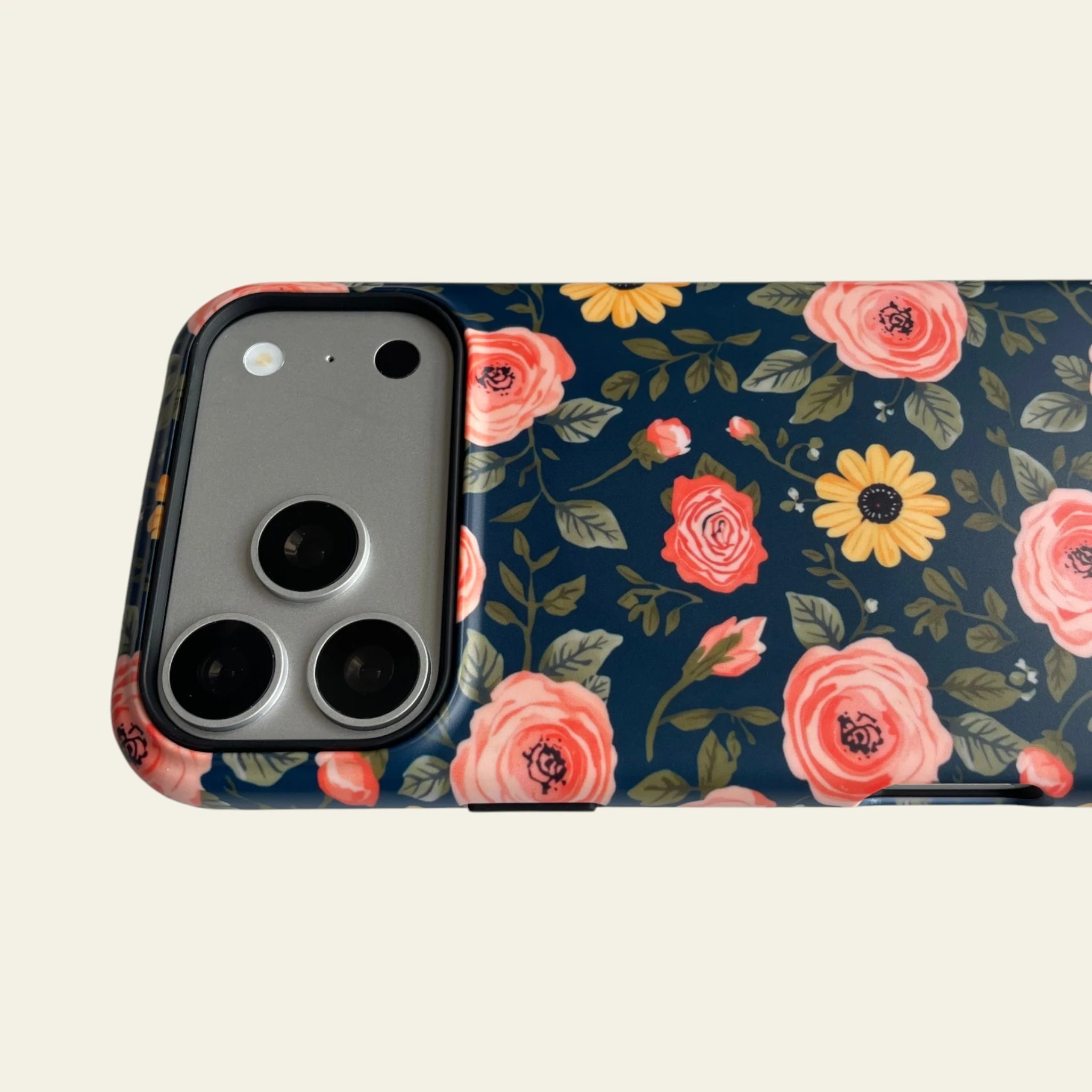 Close-up of the premium matte finish on the Navy Peach Floral case, highlighting the anti-fingerprint and not easy to fade surface.