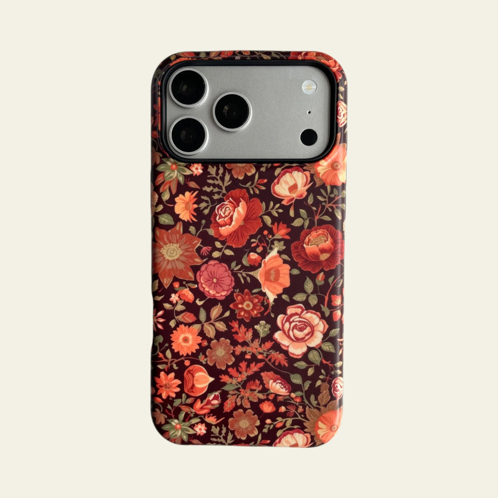 Front view of Mewvia Terracotta Floral case for iPhone 17 Pro Max, featuring earthy botanical patterns and MagSafe compatibility.
