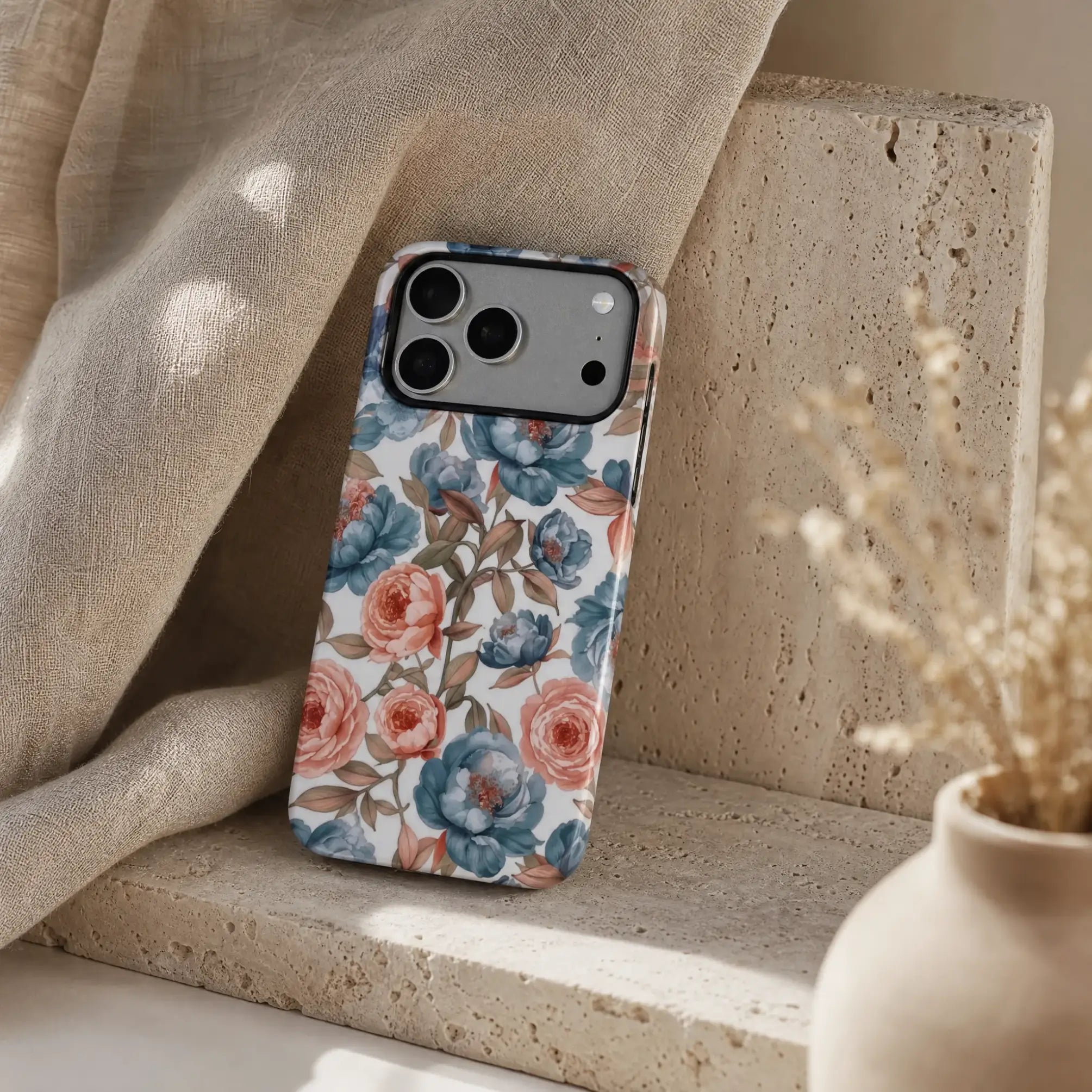 Vintage Blue Peony matte case on iPhone 17 Pro Max, styled with dried botanicals and soft shadows on a minimalist wooden desk.