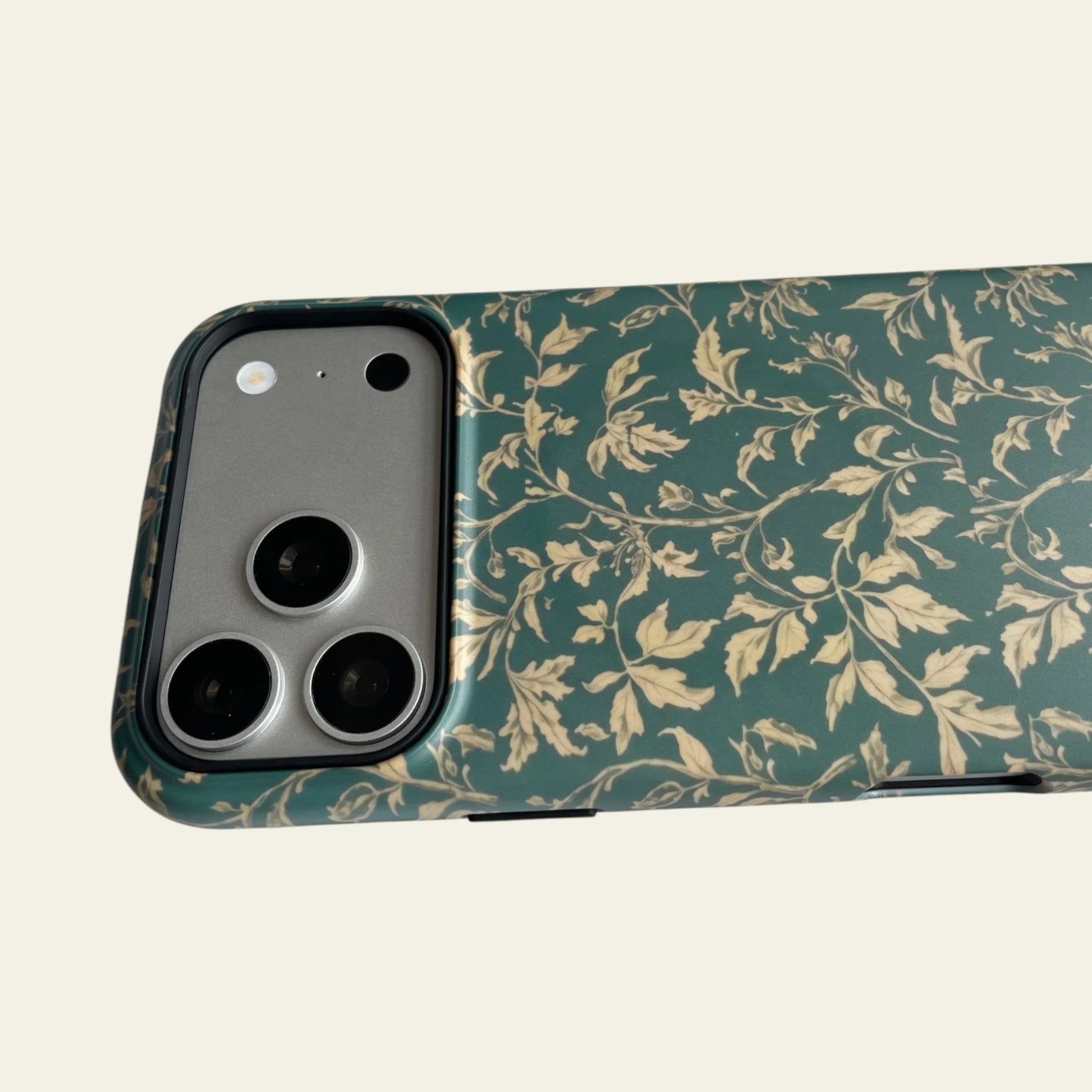 Close-up of the smooth matte surface on the Vintage Botanical case, designed to be not easy to fade and comfortable to grip.