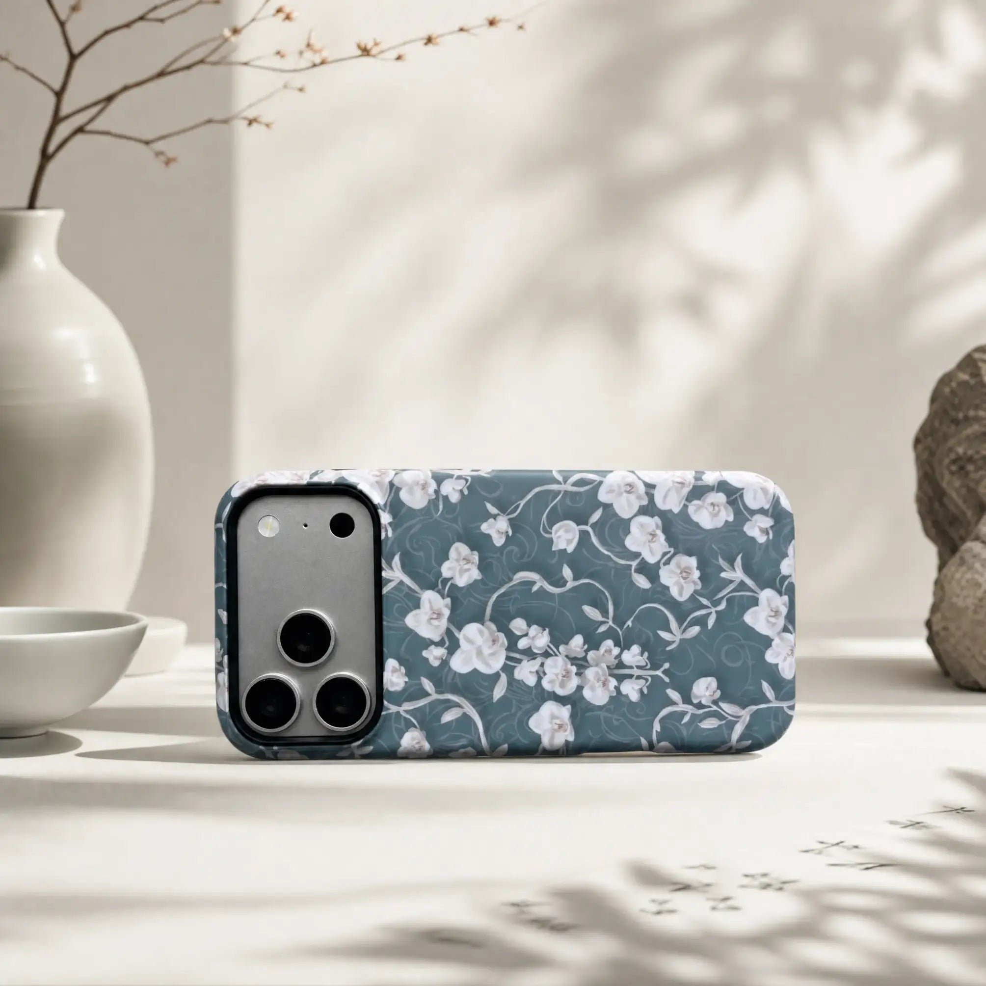 Vintage Chinoiserie Orchid matte case on iPhone 17 Pro Max, styled with minimalist ceramics and Zen-inspired shadows for a refined aesthetic.