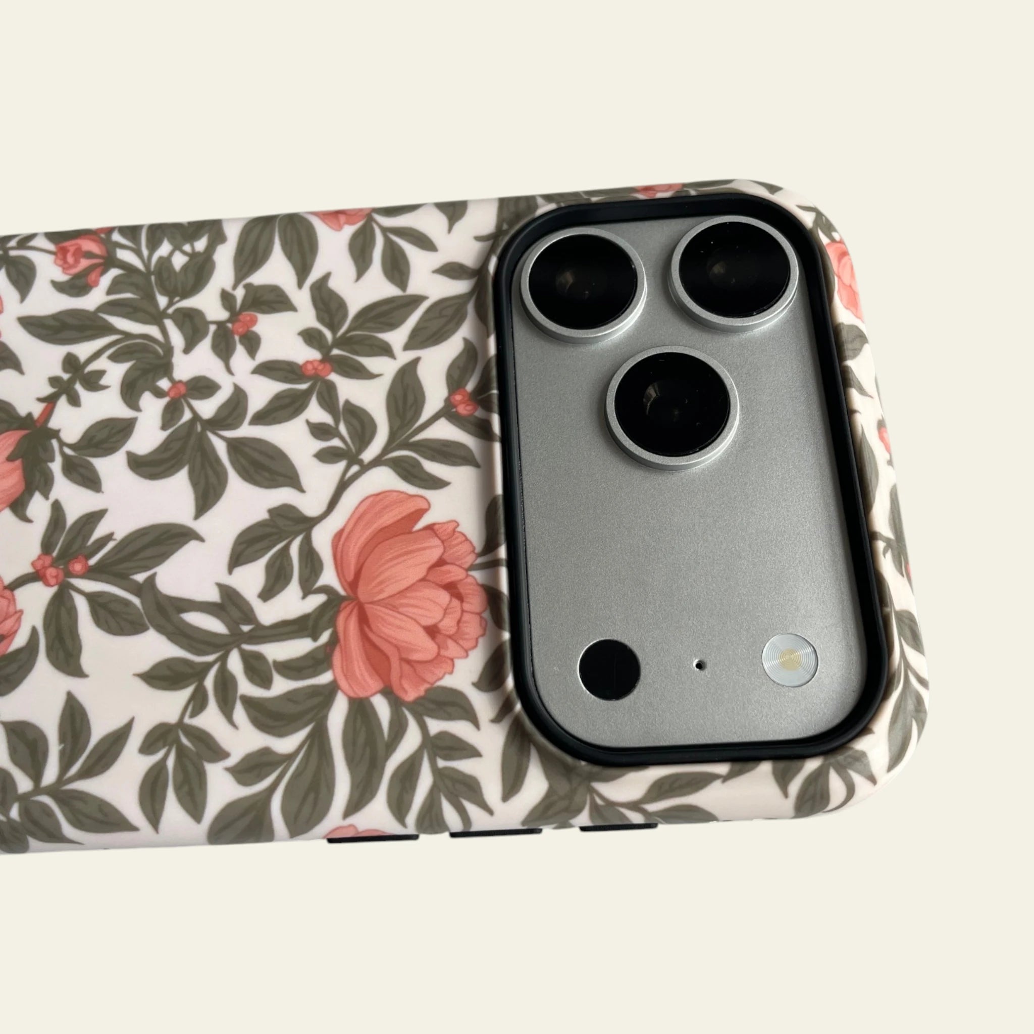 Detailed shot of the raised black camera bezel on the iPhone 17 Pro Max case, providing superior lens protection with a sleek profile.