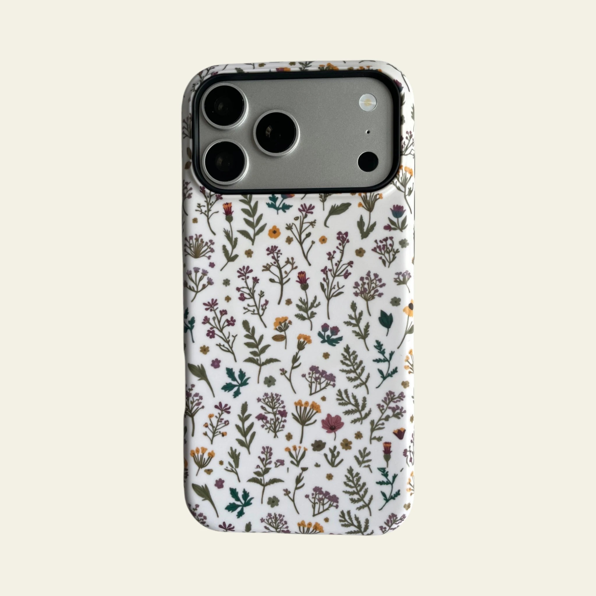 Front view of Mewvia Vintage Wildflower case for iPhone 17 Pro Max, showcasing the delicate hand-drawn botanical print and matte finish.